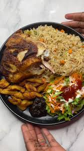 Ghana Coconut Rice, salad, plantain, and chicken 